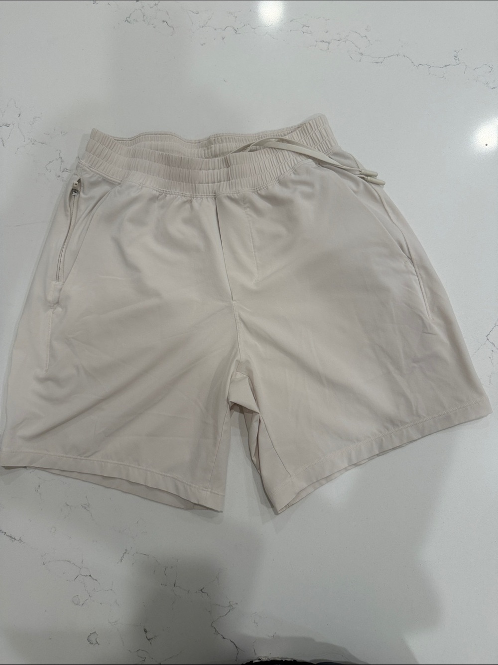 lululemon Men's Pacebreaker linerless 7 in shorts color bone